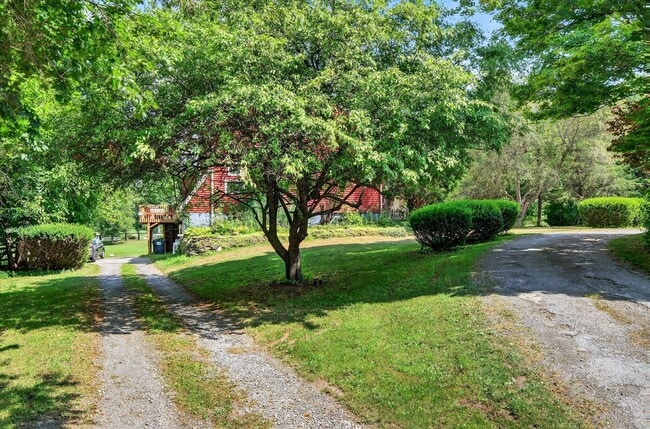 Building Photo - Price Reduction: Charming 3BR Farmhouse Re...