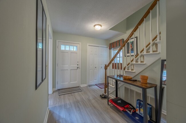 Building Photo - Price Reduction! Spacious Townhome with po...