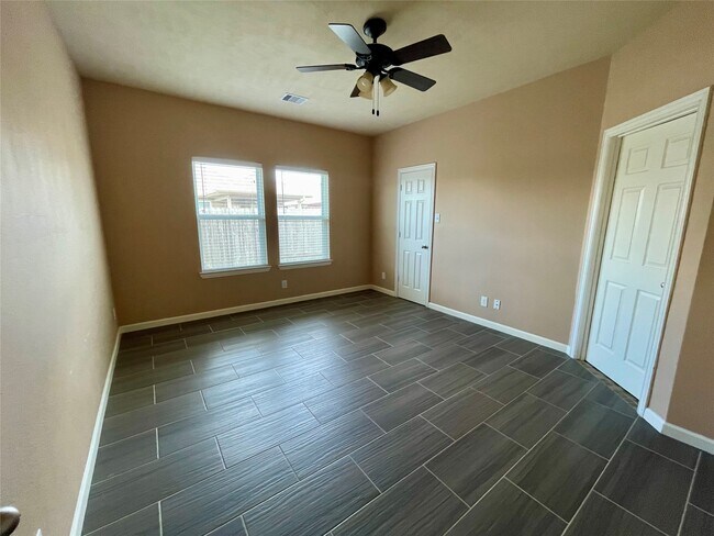 Building Photo - 10803 Woodwind Shadows Dr