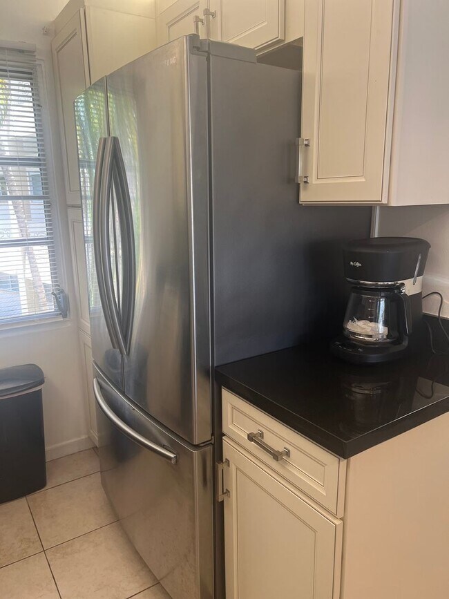 Building Photo - Charming 2-Bedroom, 2-Bath Condo at Royal ...