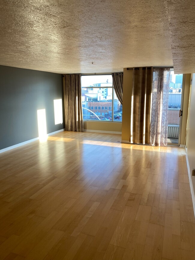 Living Room with Private Balcony - 2222 Detroit Ave