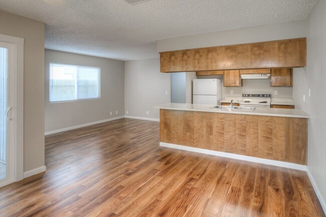 Building Photo - Greenwood Estates has an Excellent 2 Bedroom, 1.5 Bath Townhouse with a Backyard!