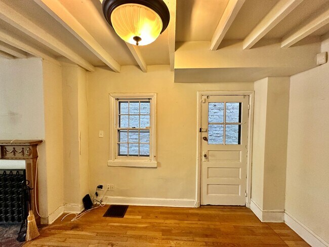 Building Photo - Glamorous Georgetown 2 Bedroom 1 Bath Historic Row Home with Patio -East Village
