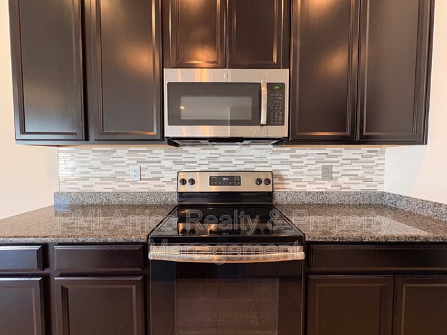 Building Photo - 7079 Woodchase Glen Dr