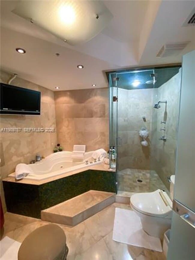 Building Photo - 6301 Collins Ave