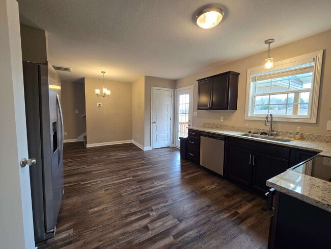 Building Photo - 807 Karmaflux Way