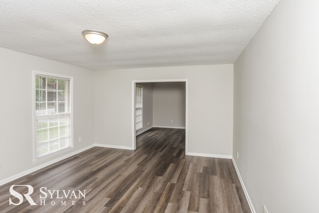 Building Photo - Come view this charming brick home