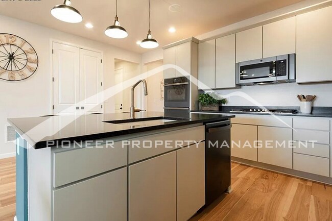 Building Photo - Stylish Main-Level Living with Finished Ba...