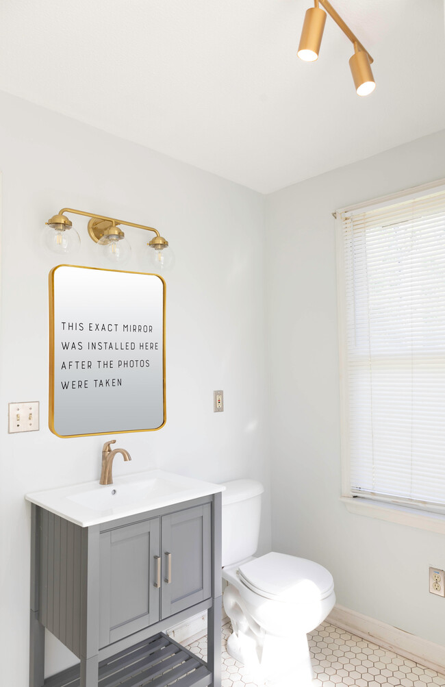 New mirror above new vanity (photo taken before mirror install) - 1217 Landon Ave