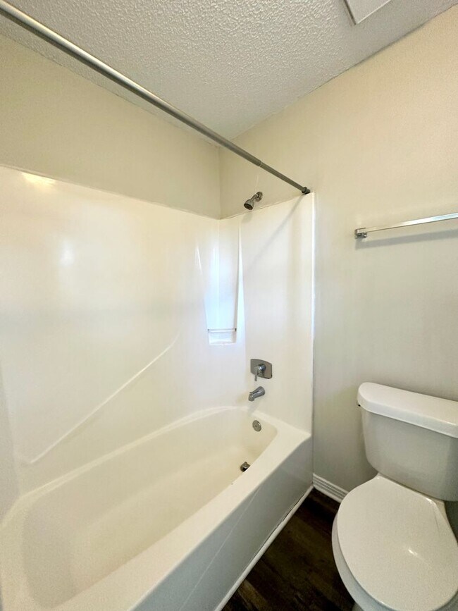 Building Photo - Charming Corner Haven 4BR/3BA Brick Home for Rent