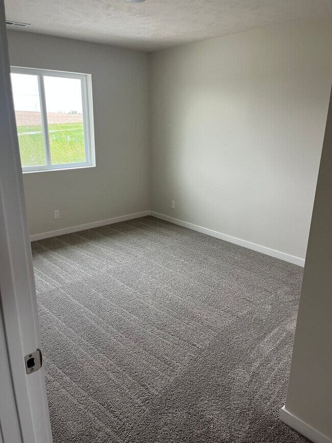 Building Photo - Spacious 5-Bedroom Duplex Near Asbury Elementary with Finished Basement & Full Amenities