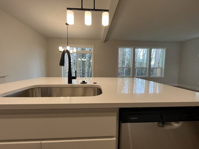 Building Photo - Modern 2025-Built 4 Bedroom Home with EV Charging, 5kW Solar, Open-Concept Living, Scenic Outdoor...