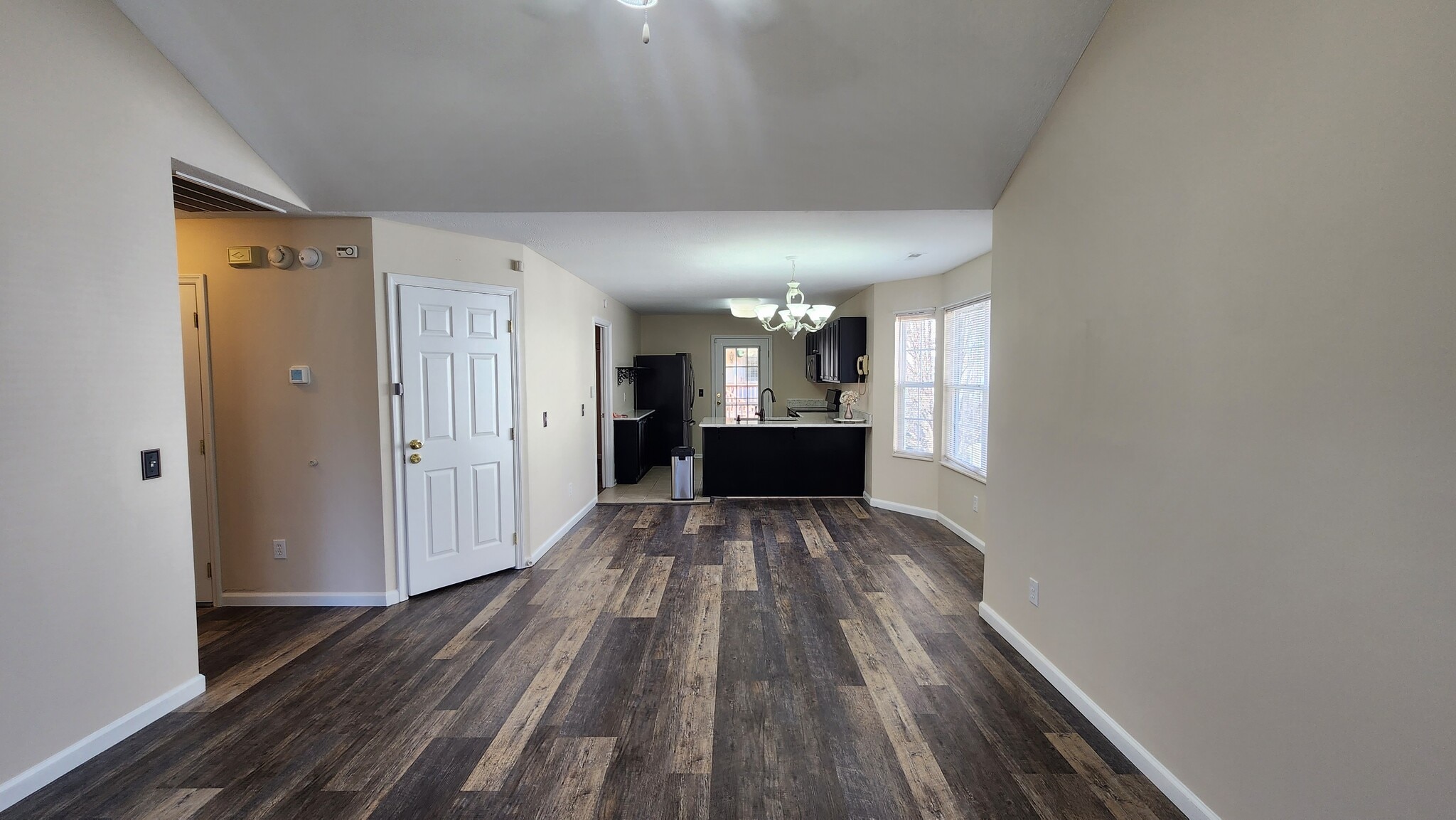 Dining room and kitchen from livingroom - 833 Plantation Dr