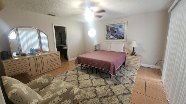 Building Photo - The Woodlands of Palm Coast- FURNISHED- 4 ...