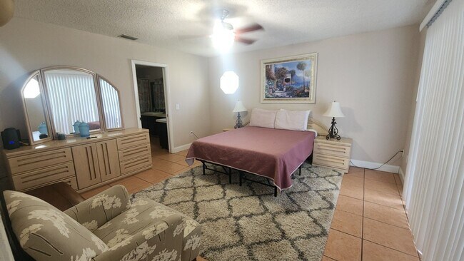 Building Photo - The Woodlands of Palm Coast- FURNISHED- 4 Bedroom 2 Bath- Long Term