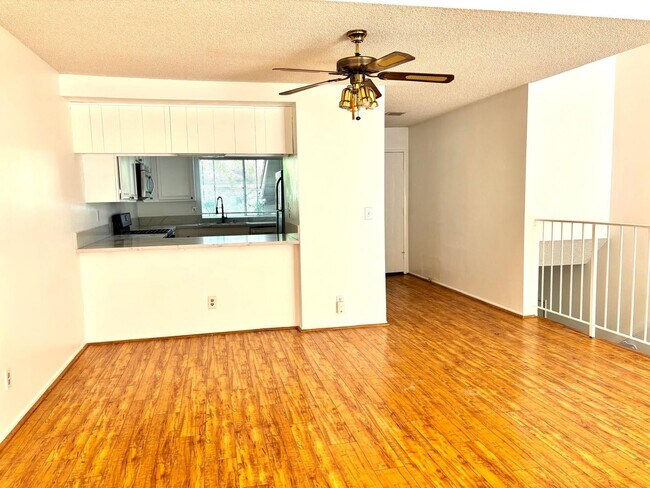 Building Photo - Available Now is a Condo style Townhouse i...