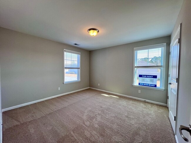 Building Photo - 3 bed/2.5 bath at end unit townhome in Berkeley Walk at Savannah Quarters with garage