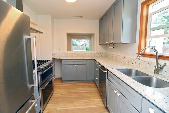 Building Photo - Meticulously Remodeled Milwaukie Bungalow on Large Lot with Gardens & Garage
