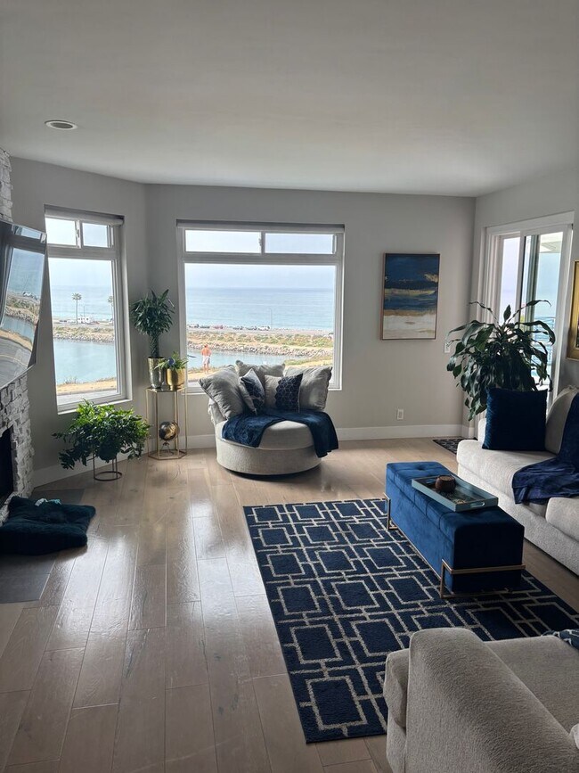 Building Photo - Enjoy unforgettable sunsets, fresh ocean air, and coastal living at its absolute best.