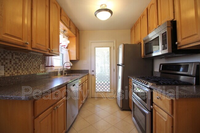 Building Photo - 8504 Wagon Wheel Rd