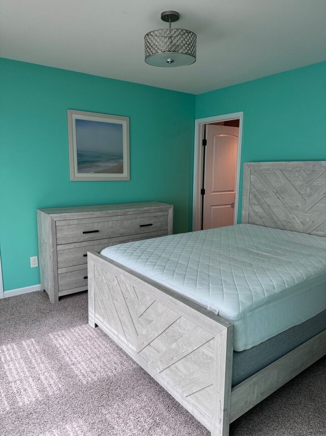 Building Photo - Coastal Cutie! 3BR/2BA Furnished Home Avai...