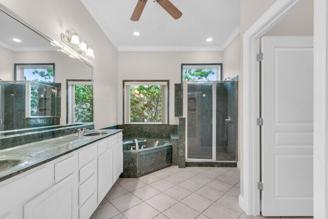 Building Photo - MOVE IN SPECIAL: 30% OFF FIRST MONTHS RENT -- Spacious unfurnished 4B/3B home in Gated Community ...