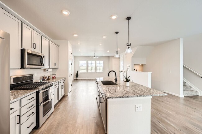 Building Photo - Evolve Real Estate: Available Immediately! Almost NEW Large 3 Bedroom in STERLING RANCH!