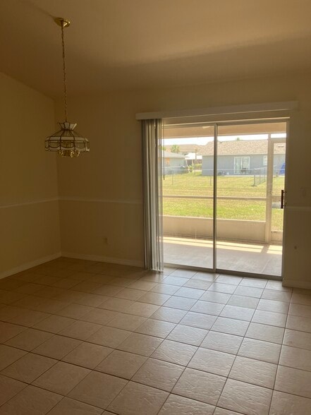 Dining area and additional living space - 3222 SW 7th Pl