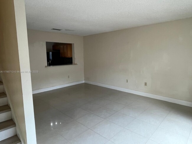 Building Photo - 9491 Palm Cir N