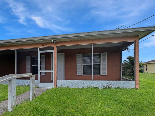 Building Photo - Your Duplex Dream Just Got Merrier! Charmi...