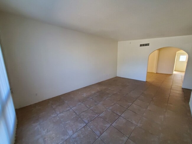 Building Photo - 4 bedrooms and 2 bathrooms with A/C.