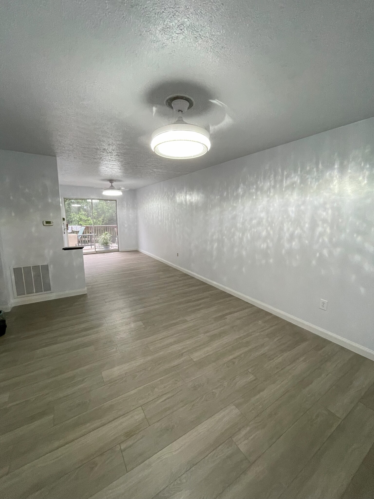 Full picture of living room and dining room together - 672 Chester Ave