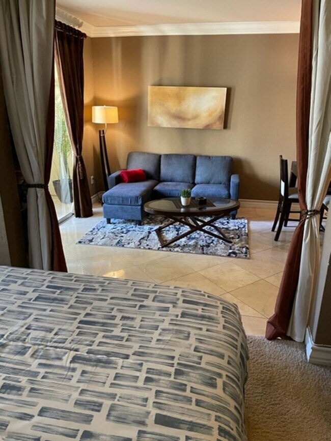 Building Photo - Meridian STUDIO Condo Fully Furnished near Main Pool-Lush Green trees in Resort Style Community.