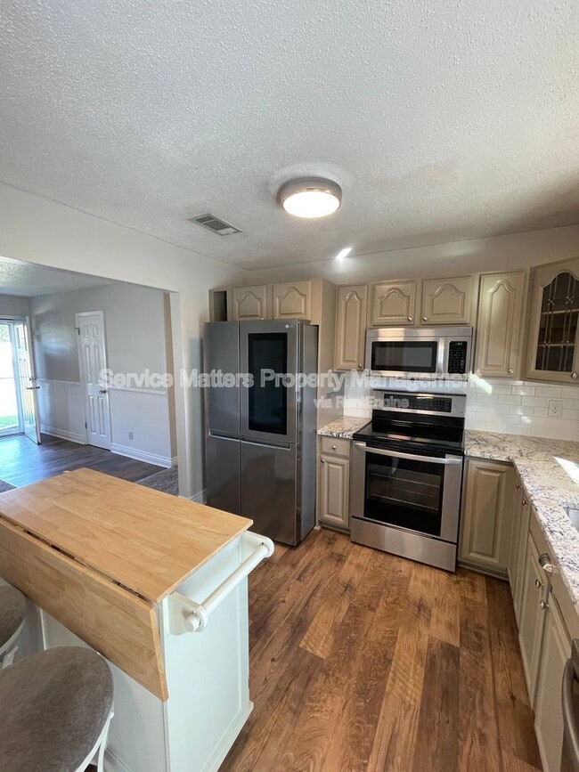 Building Photo - 5057 Pennington Ln