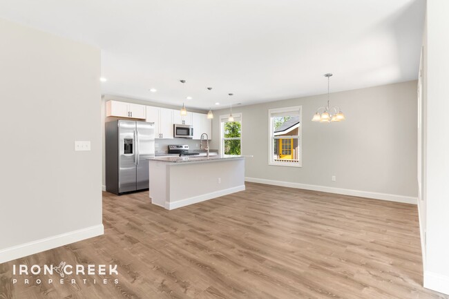 Building Photo - Bright and Modern: New Construction Three-...