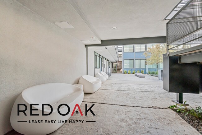 Building Photo - Bright and Airy One Bedroom Featuring a Sp...