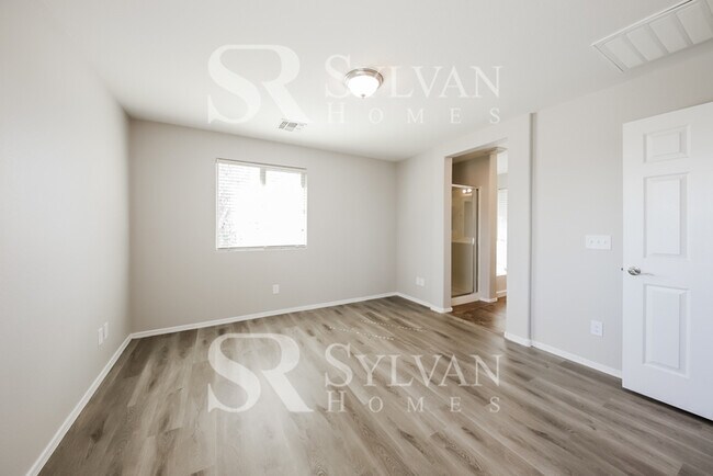 Building Photo - This home exudes a cheerful and welcoming charm!