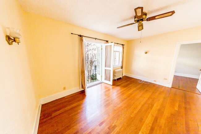 Livingroom Open French Doors - 503 N Arthur Ashe Blvd