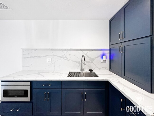 Building Photo - Stylish 2BR in Gated Community | Pool, Jacuzzi & Balcony