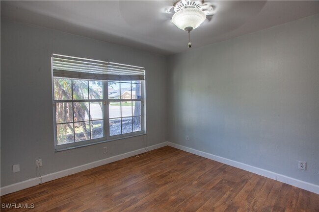 Building Photo - 9511 Cypress Dr N