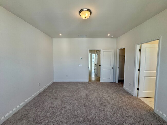 Building Photo - Beautiful New Construction, Three Story To...