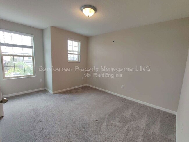 Building Photo - 7408 French Marigold Ave.