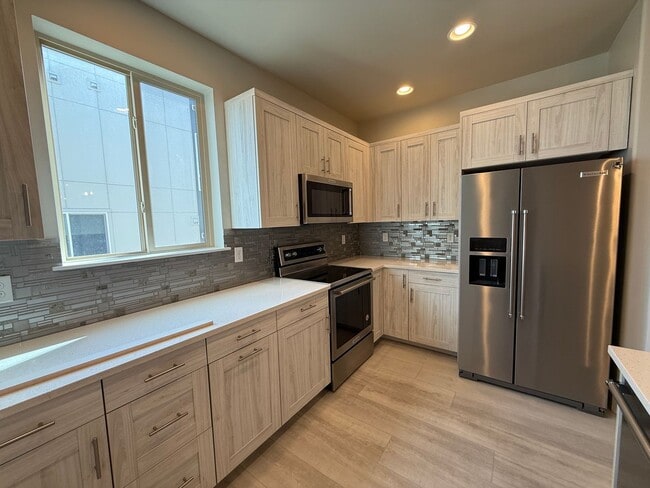 Building Photo - Modern Townhouse with Rooftop Deck & Mountain Views Near Sloan’s Lake!!