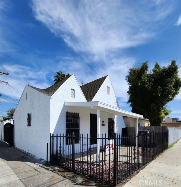 Building Photo - 9320 Normandie Ave