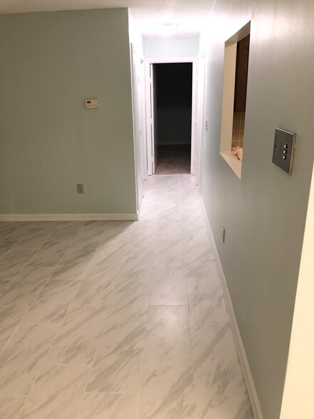 Nighttime picture of hall going to bdrms - 107 Oak Ln