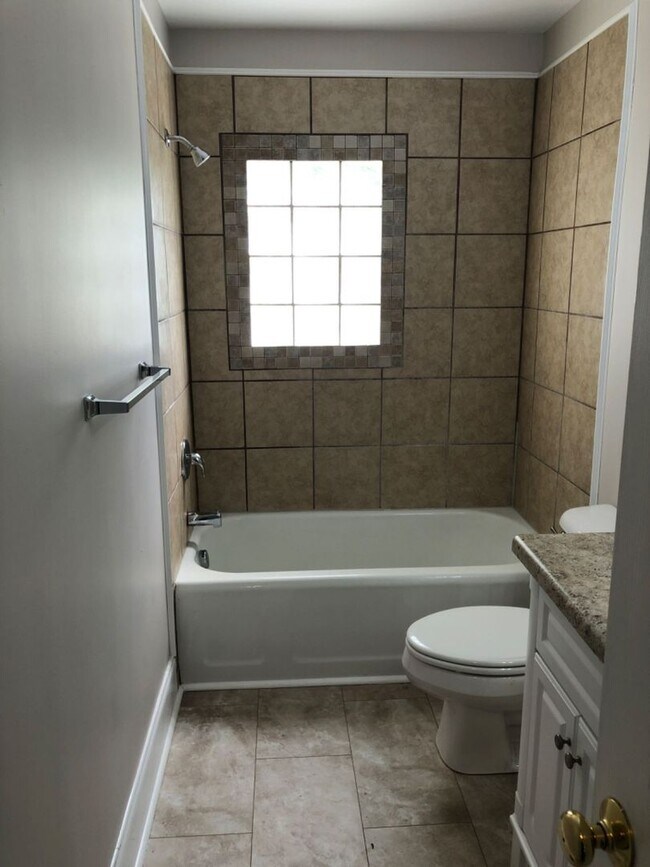 Building Photo - Coming Soon! Just off the main road, but in walking distance to everything!