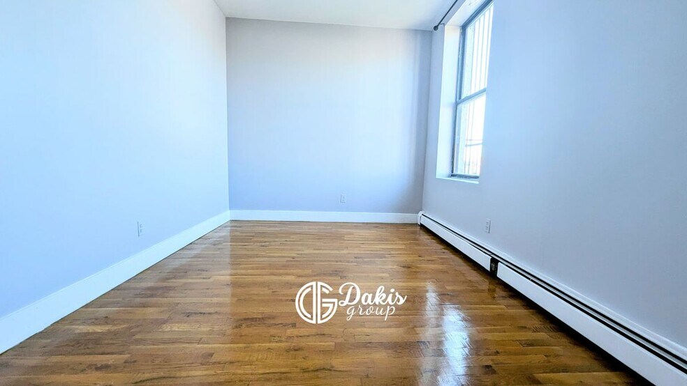 Building Photo - 23-34 28th Avenue, 1