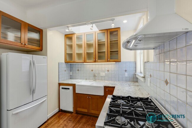 Building Photo - Intimate Luxury Space w/ Chef's Kitchen, 2 New Baths; Private Deck Overlooks Zen Courtyard