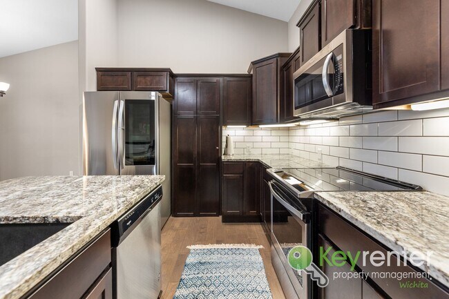 Building Photo - Spacious 4-Bedroom Home with Finished Basement & 3-Car Garage – Derby, KS