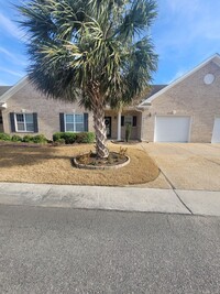 Building Photo - This 3 bedroom 2.5 bath brick townhouse wi...